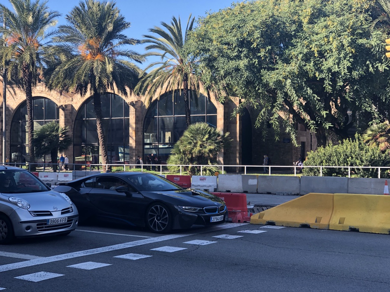 An i8 stuck in city traffic in Barcelona.